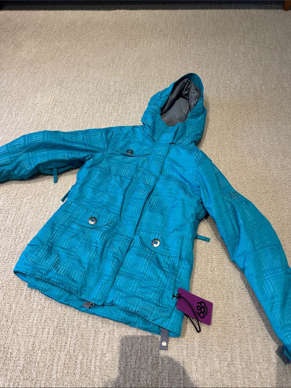 Woman’s Teal Hooded Winter Jacket